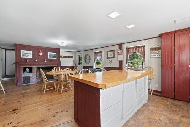 kitchen featuring hardwood / wood-style flooring and a kitchen island