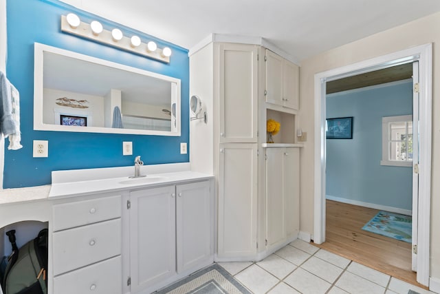 bathroom featuring wood-type flooring and vanity