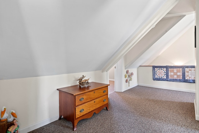 bonus room with carpet floors and lofted ceiling