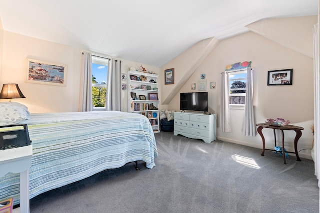 carpeted bedroom featuring lofted ceiling