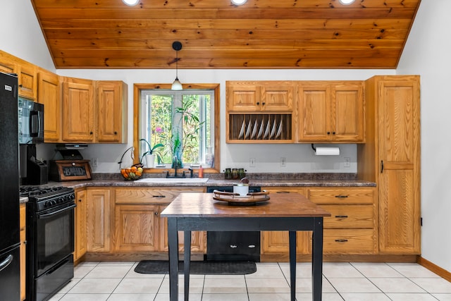 kitchen featuring wooden ceiling, black appliances, lofted ceiling, and light tile patterned floors