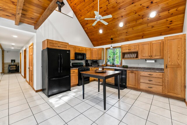 kitchen featuring sink, high vaulted ceiling, black appliances, light tile patterned floors, and ceiling fan