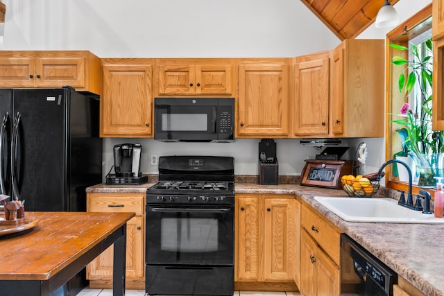 kitchen featuring sink, vaulted ceiling, wooden ceiling, and black appliances