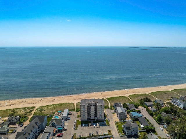 bird's eye view with a view of the beach and a water view