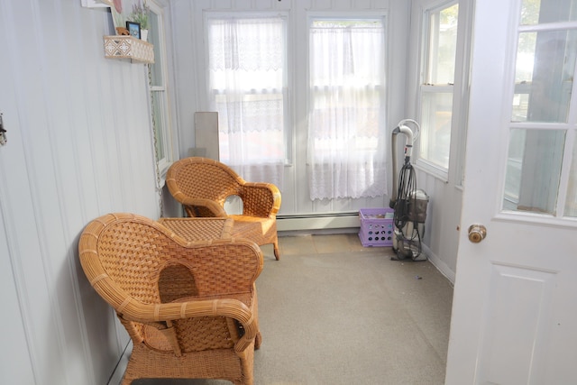 sunroom / solarium featuring a baseboard radiator