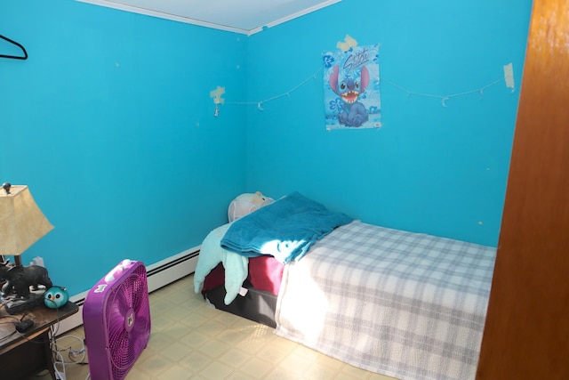 bedroom featuring a baseboard heating unit