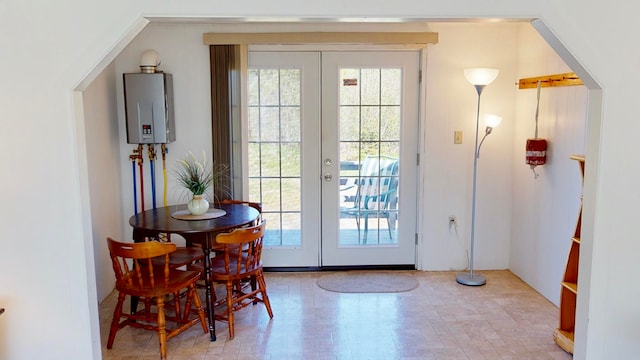 entryway featuring french doors and a healthy amount of sunlight