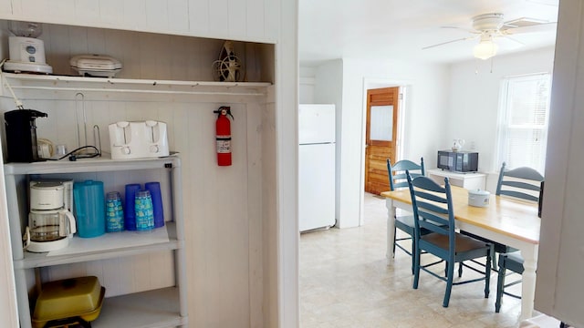 kitchen featuring white refrigerator and ceiling fan