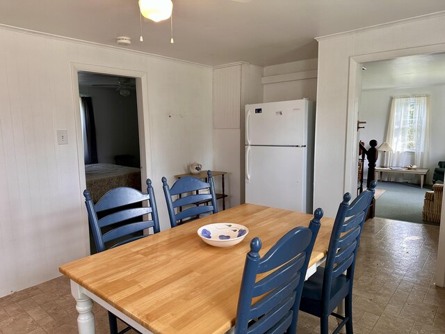 dining room with crown molding