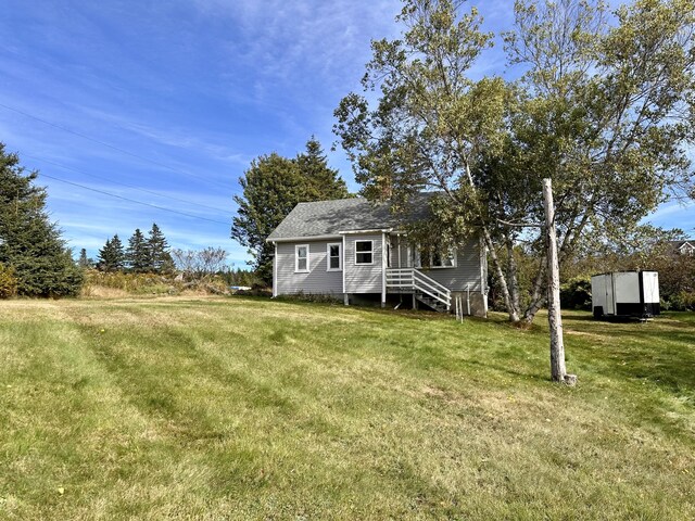 view of front of home with a front lawn