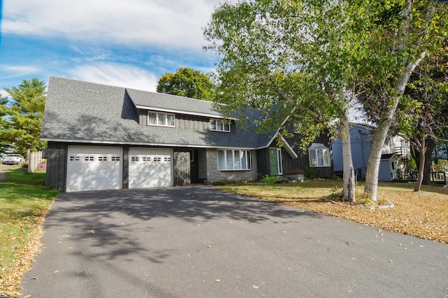 front of property featuring a garage