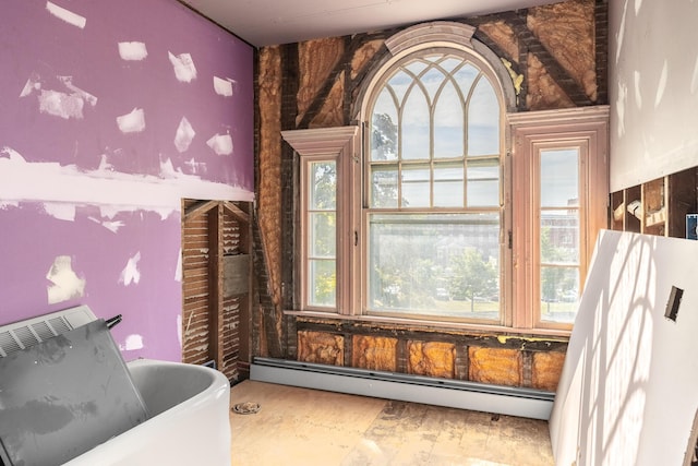 interior space featuring a baseboard heating unit