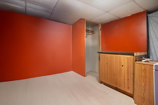 empty room with a paneled ceiling