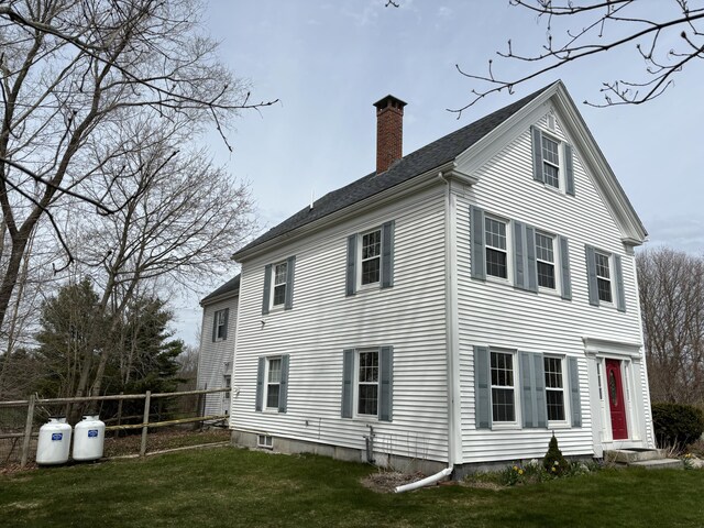 exterior space featuring a lawn