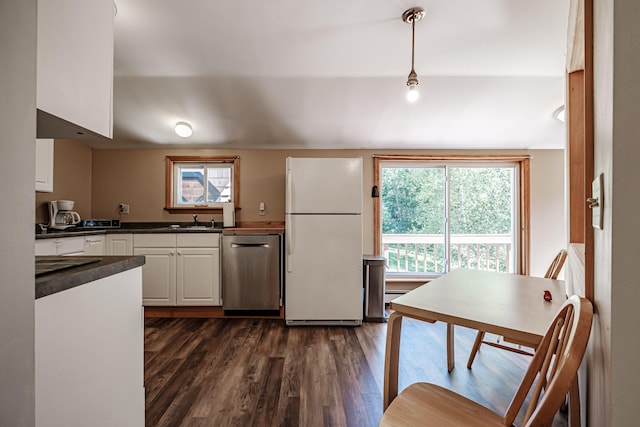 kitchen featuring white cabinets, white refrigerator, hanging light fixtures, dishwasher, and dark hardwood / wood-style floors