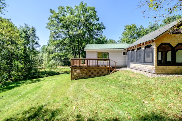 view of yard with a deck