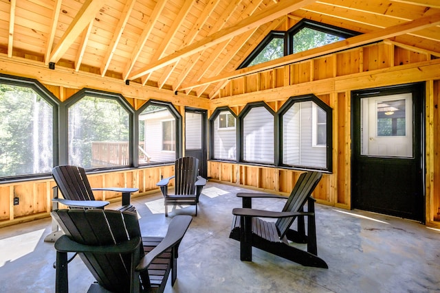 sunroom / solarium with lofted ceiling with beams and wood ceiling