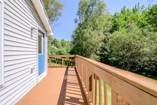 wooden balcony featuring a wooden deck