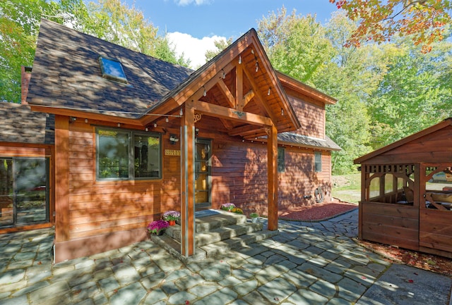 exterior space featuring a carport