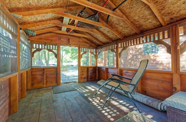 sunroom / solarium with vaulted ceiling