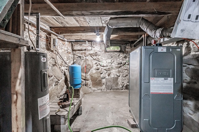 utility room featuring water heater