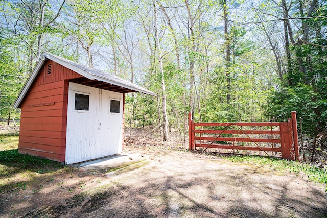 35 Middle Rd, Acton, ME 04001 - view of shed featuring a view of trees and fence