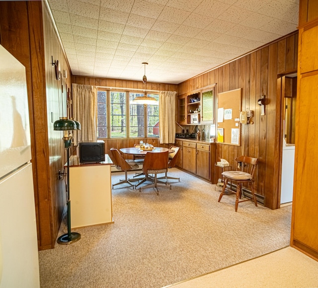 35 Middle Rd, Acton, ME 04001 - dining area with wood walls and light colored carpet