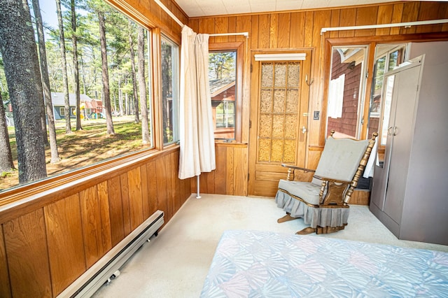 35 Middle Rd, Acton, ME 04001 - sunroom with healthy amount of natural light and a baseboard heating unit