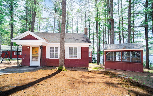 35 Middle Rd, Acton, ME 04001 - view of front facade featuring a chimney and a shingled roof