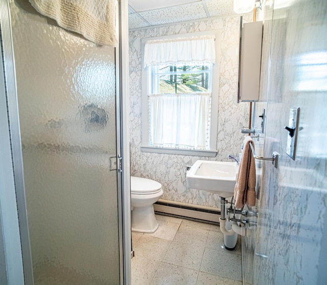 35 Middle Rd, Acton, ME 04001 - full bath featuring wallpapered walls, a stall shower, a sink, toilet, and a baseboard heating unit