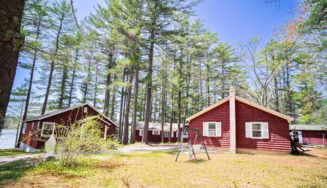 35 Middle Rd, Acton, ME 04001 - back of house featuring a chimney and a yard