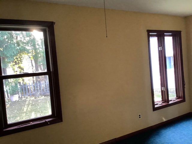 view of carpeted spare room