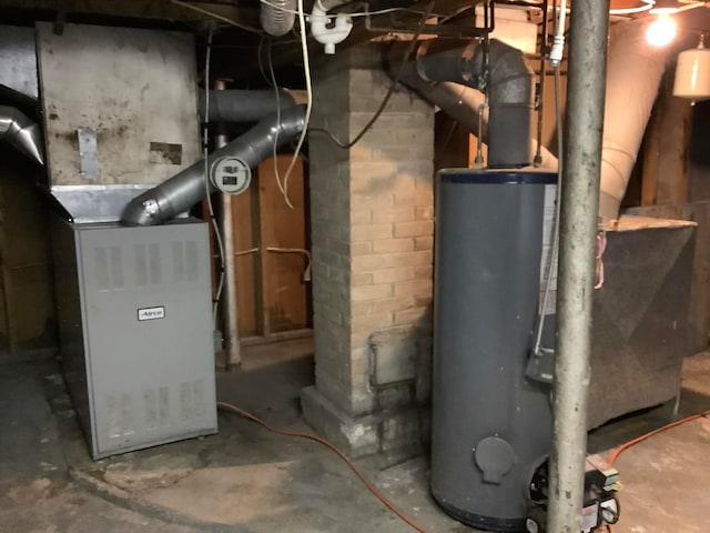 utilities featuring gas water heater and heating unit