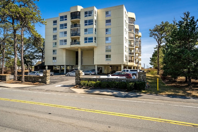 215 E Grand Ave Unit 206, Old Orchard Beach, ME 04064 - view of apartment building / complex featuring uncovered parking