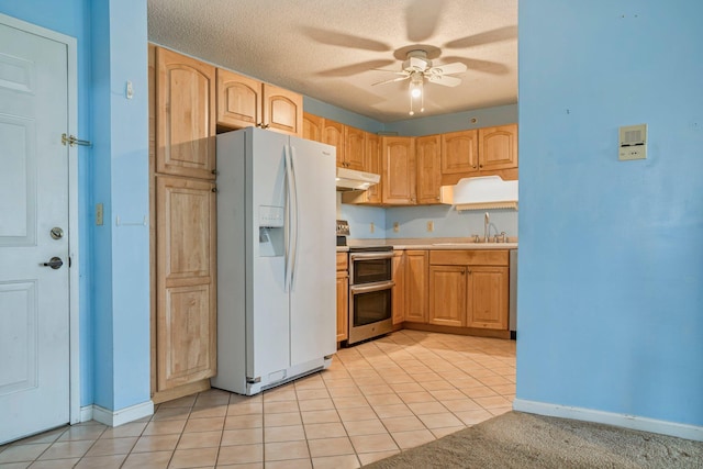 215 E Grand Ave Unit 206, Old Orchard Beach, ME 04064 - kitchen with white fridge with ice dispenser, double oven range, under cabinet range hood, a sink, and a ceiling fan