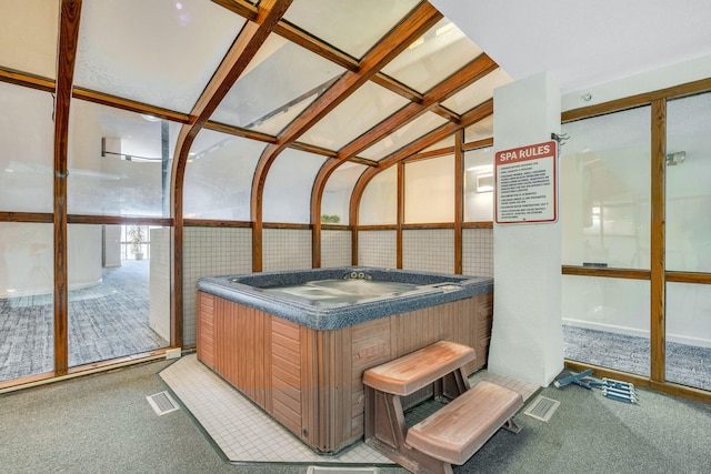 215 E Grand Ave Unit 206, Old Orchard Beach, ME 04064 - sunroom featuring a hot tub