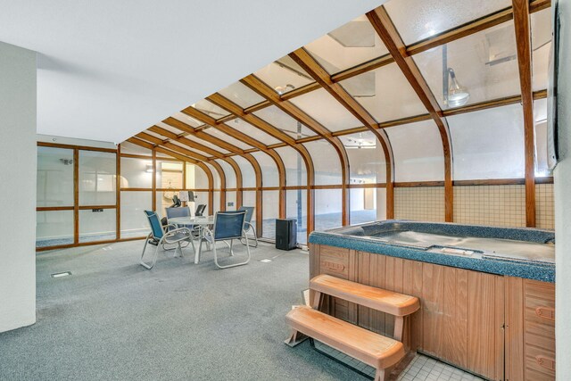 215 E Grand Ave Unit 206, Old Orchard Beach, ME 04064 - sunroom / solarium featuring a jacuzzi and lofted ceiling