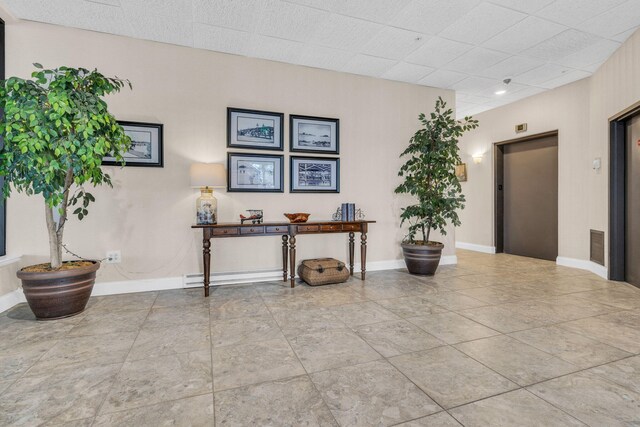 215 E Grand Ave Unit 206, Old Orchard Beach, ME 04064 - interior space featuring elevator and baseboards