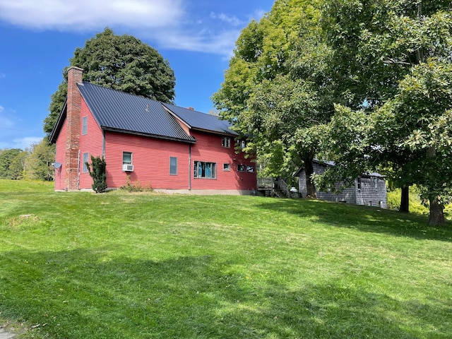 exterior space featuring a lawn and cooling unit