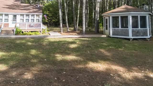 view of yard with a deck