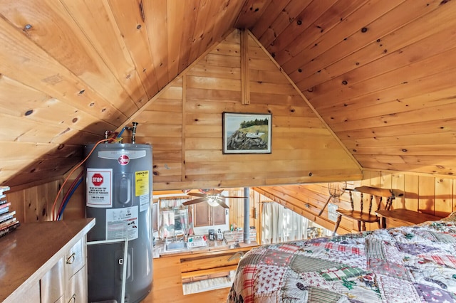 bedroom with electric water heater, lofted ceiling, wood walls, and wood ceiling