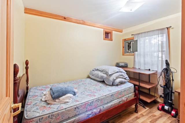 bedroom featuring hardwood / wood-style flooring