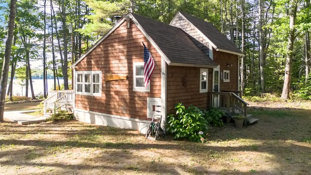 view of side of property with a water view