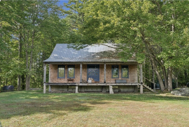 view of front of home with a front yard