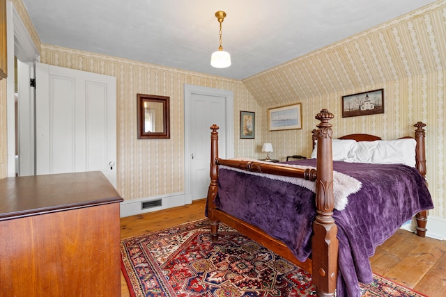 bedroom featuring hardwood / wood-style flooring