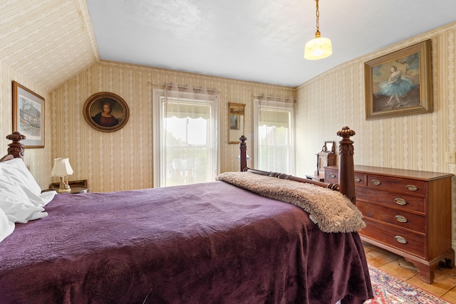 tiled bedroom with lofted ceiling