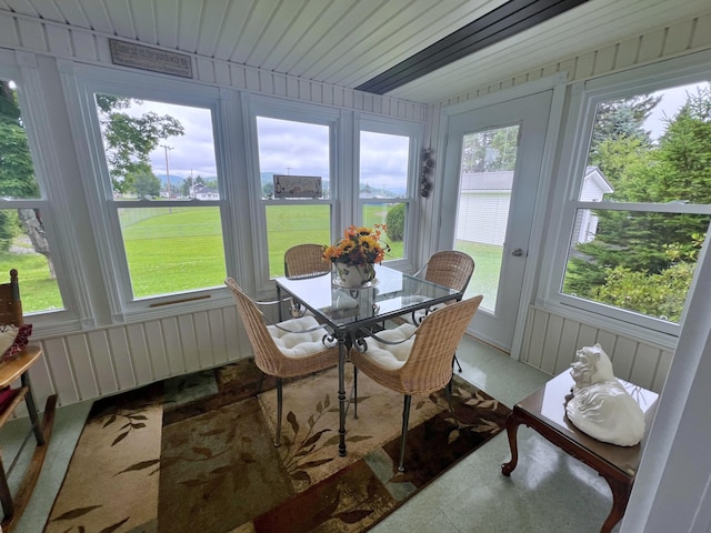 sunroom / solarium featuring a wealth of natural light