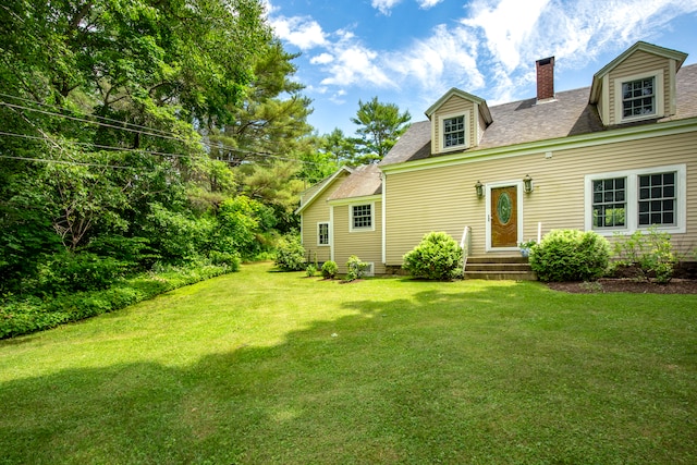 exterior space with a yard