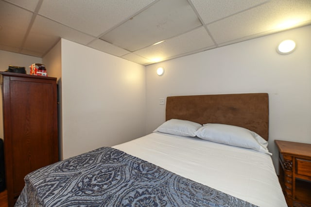 bedroom featuring a paneled ceiling