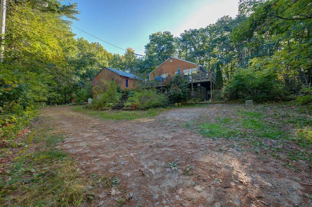 view of yard featuring a deck